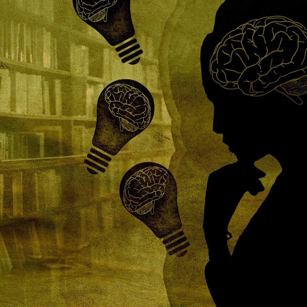 woman thinking in front of bookshelves